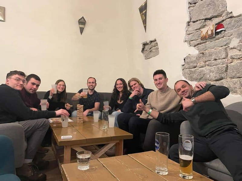 Tallinn: Bar Crawl with Shots, Beer, and Nightclub Entry - Walking to the first bar
