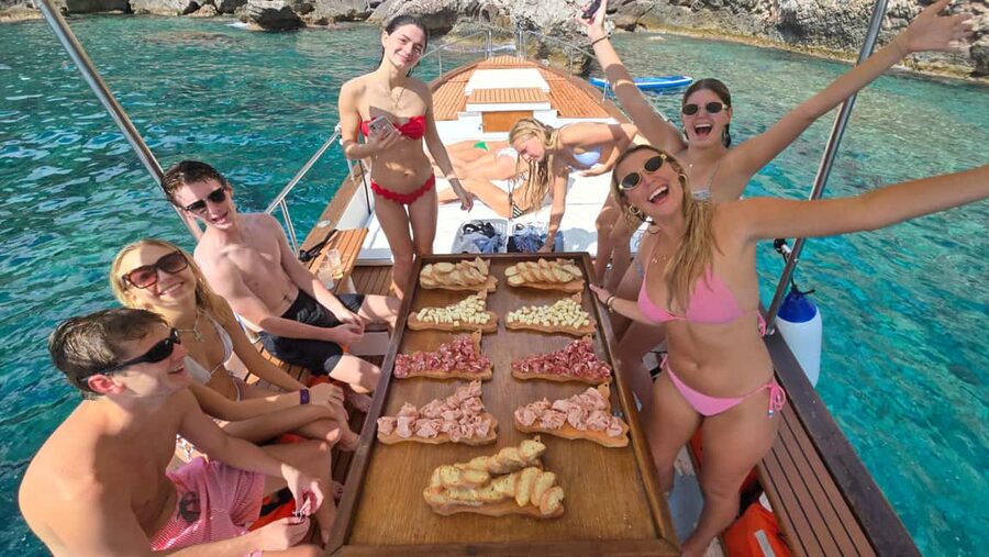 Taormina: Boat Tour with Sicilian Wine Tasting - Cruising past Taormina’s bays and caves