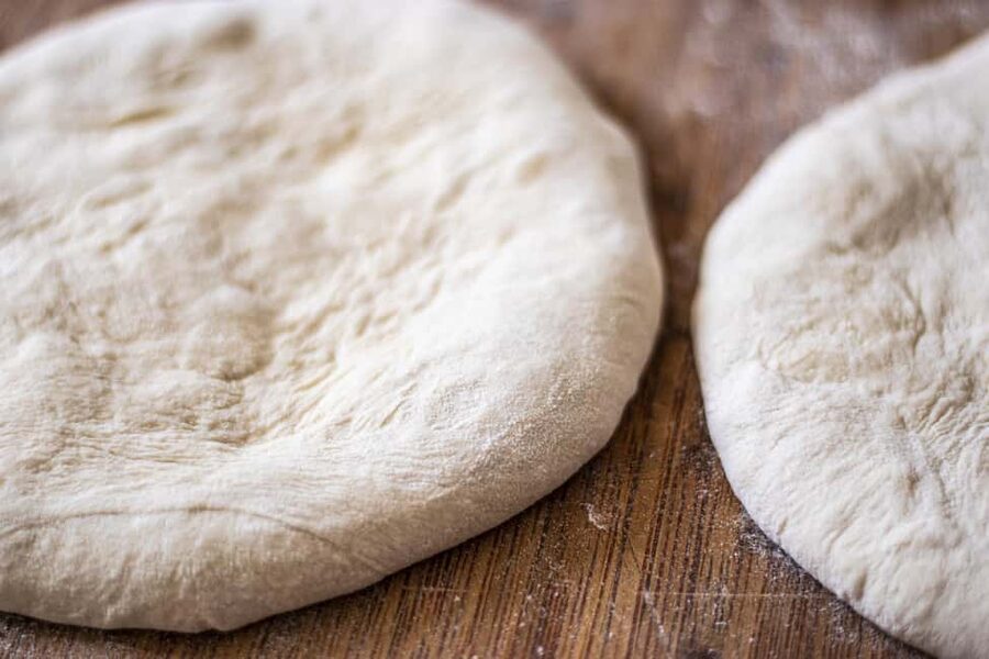 Taormina: Pizza Making Class with Lunch and Wine Tasting - Shaping your own pizza dough