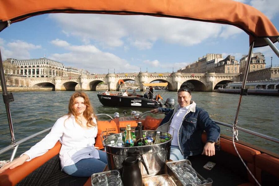 Top Private Cruises in Paris with Champagne + more surprises - The Louvre and central Paris from the water