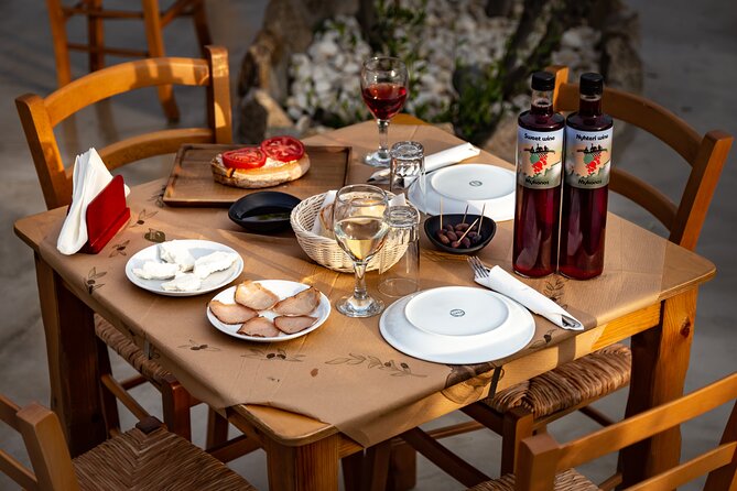 Tour and Wine Tasting in Mykonian Land - Two Wines, Homemade Food, and a Long Table