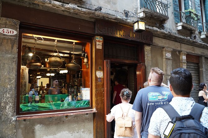 Venice Like a Local: Food, Wine & Spritz Tour with Traghetto Ride - The Rialto seafood tasting with Prosecco