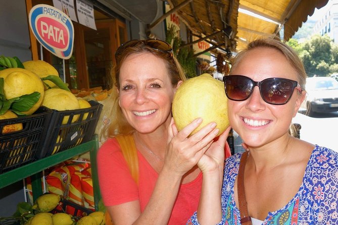 Walking Food Tour in Sorrento w/ Limoncello Factory Lemon Grove - A seated trattoria stop with pasta and wine