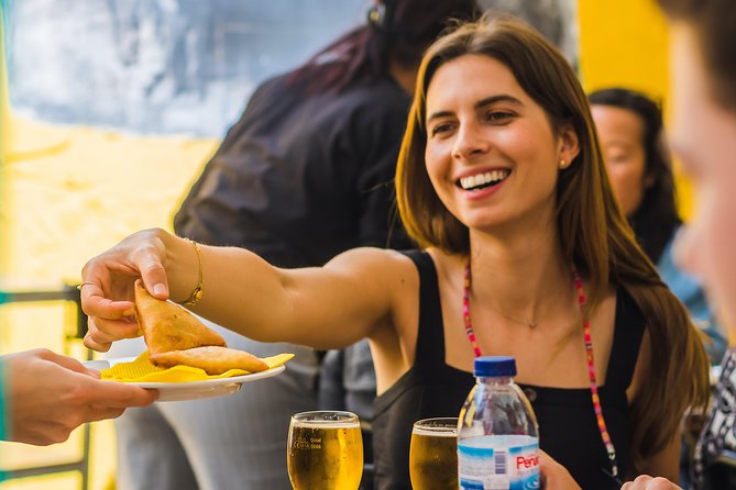 Winner 2025 Undiscovered Lisbon Food & Wine Tour by Eating Europe - Ginjinha Popular: chorizo, bifana, and a first toast
